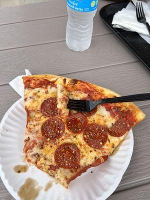 Pepperoni pizza slice