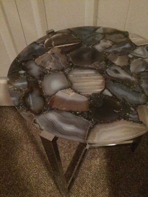 This beautiful cut stone table for the den