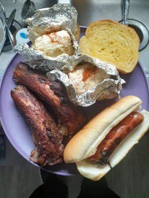 Mapel glazed organic beef ribs and elote with garlic bread