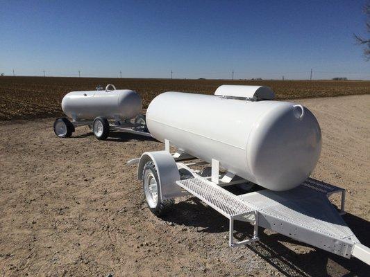 Two blasted & painted 500 gallon LP tanks.