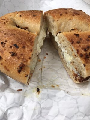 Onion bagel with jalapeño cream cheese.