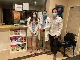 Photo of me and my GF with Dr. Hung.