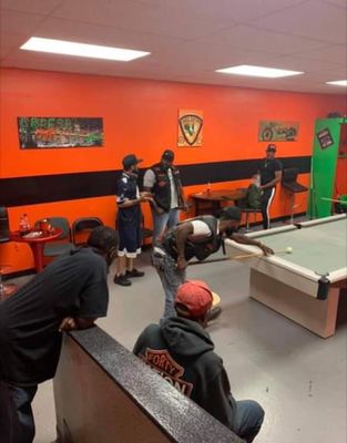 Playing pool in the clubhouse