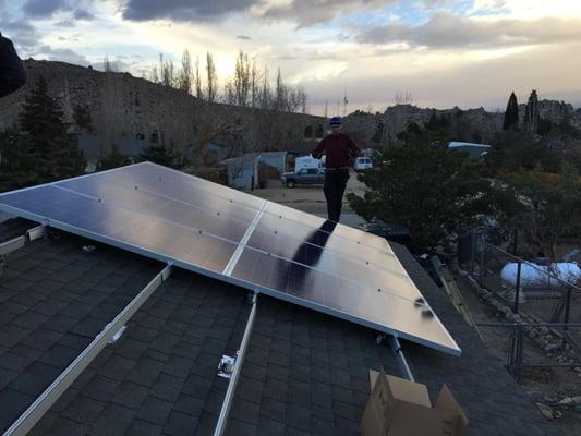 Proudly serving Bishop and Owens Valley.    One proud homeowner learning to install his own solar system with our training.