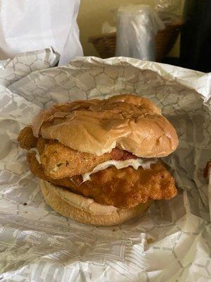 Chicken sandwich with mozzarella sticks on top