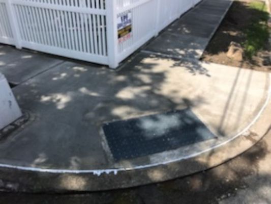 New fresh sidewalk and curb