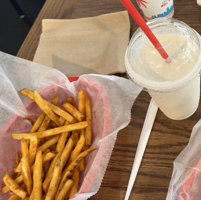 Seasoned Miami Grill French fries and a vanilla milkshake