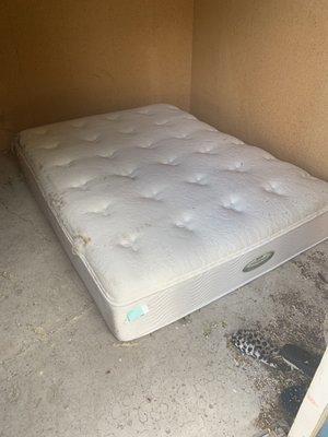 Destroyed mattress amongst other items