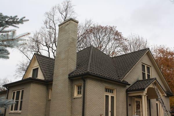 Stone Coated Metal Barrel Tile Roof on a turn of the Century house