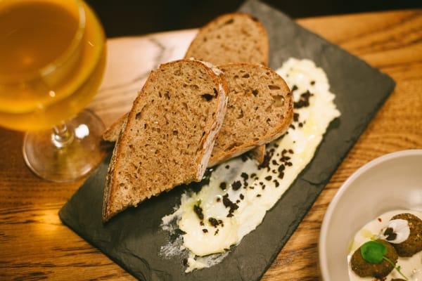 Warm sourdough baked daily, with cultured butter