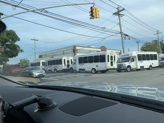 All double parked around the block causing a hazard