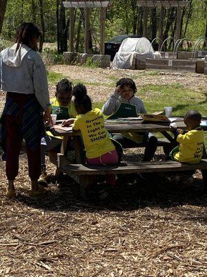 Our Star-Seeds having a little Art Therapy in our outdoor classroom.