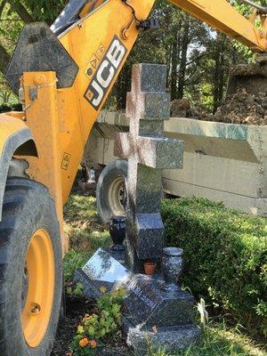 This is a photo of my grandmothers grave being driven over and parked on with a stake implanted INTO her grave.