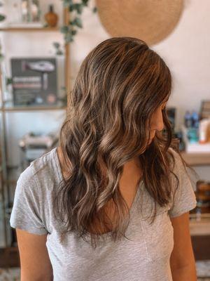 Soft light brown highlights in dark brown hair