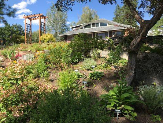 One of our seven gardens, the Frances B. Field Memorial Garden featuring many flowers. Check out our gardens brochure on the website!