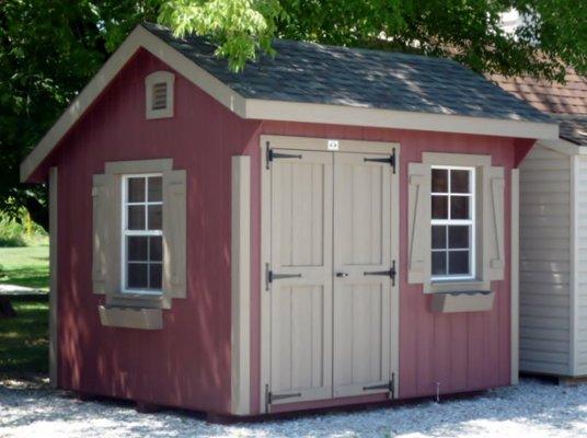 8x10 Garden House with Burgundy painted SmartSide T1-11 and Clay trim