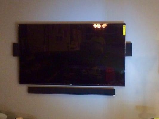 Home theater TV mount with sound bar. All wires hidden