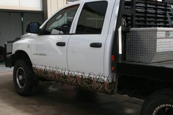 We repaired this truck and added some fun Camo to the sides. what do you think?