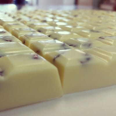 White Chocolate Cherry Bars all lined up just out of the molds.  
#cherry #whitechocolate #glutenfree