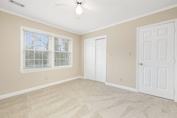 Carpeted bedroom