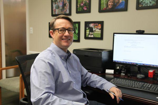 Trent Harris at his desk