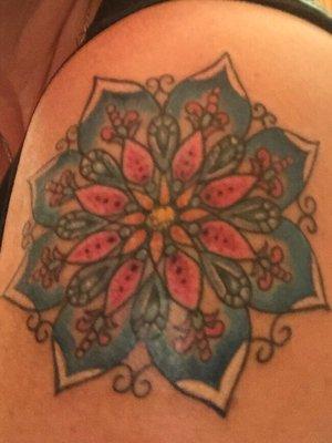 A gorgeous mandala Tattoo created by Diane