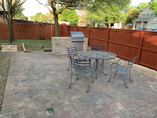 A new paver patio and custom block bbq pit make for a great outdoor space for entertainment!