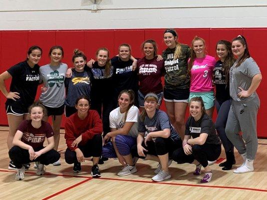 Walled Lake Northern Varsity Softball after a hard core workout.