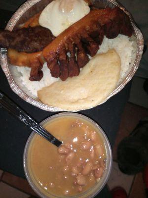 The MINI BANDEJA..steak..a big strip of fried pork rind..rice...one sweet plantain..one fried over medium egg and BEANS!!