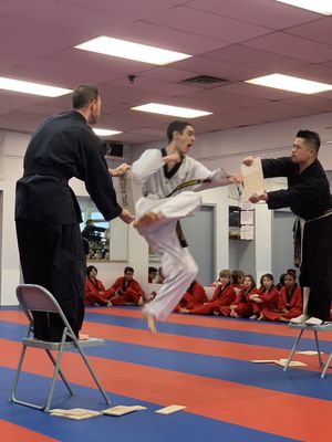 Awesome shot of assistant instructor Jake performing a "superman" break at our annual Fundraiser!