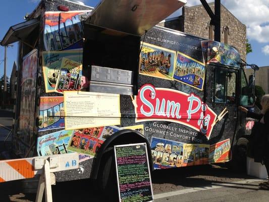 www.sumpigfoodtruck.com was at the corner (same side of road as theater) right next to the Rita's, which is next door!