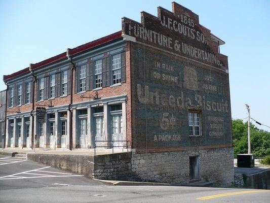 Built in 1842 by John Poston. The Poston Building, considered one of the oldest commercial buildings still in use, had five c...