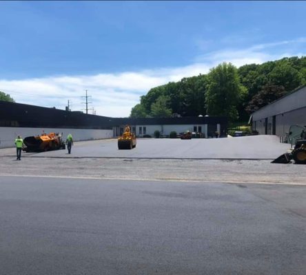 Rolling asphalt to a smooth finish