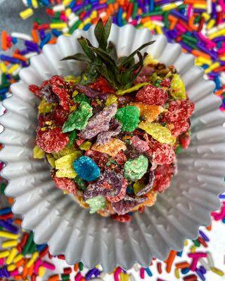 Fruity Pebble Monster chocolate dipped strawberry dipped again in fruity pebble bits. Fine fruity pebble bits are available upon request.