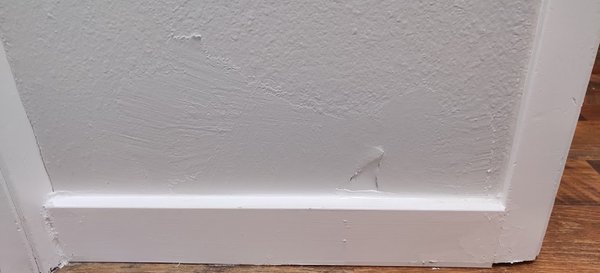 Powerhouse was hired to paint the wall and install this base board.