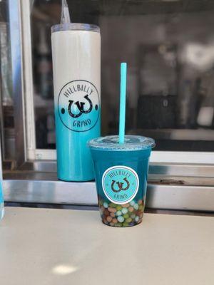 This is our Kids Shark Bite, blue raspberry lemonade with gummy sharks and bursting boba.