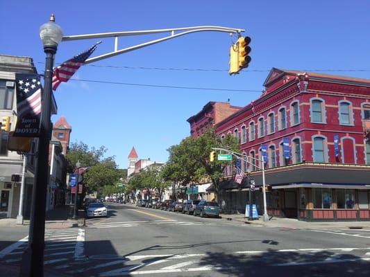 To the left AFTER Sussex St you will see the dollar Corner on 12 West Blackwell St. On the right is Berkeley College red &  blue