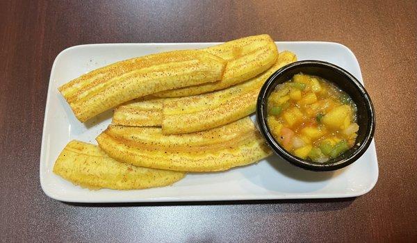 Fried plantains with a mango, pineapple, and green bell pepper salsa. They were fluffy and crispy like fries!