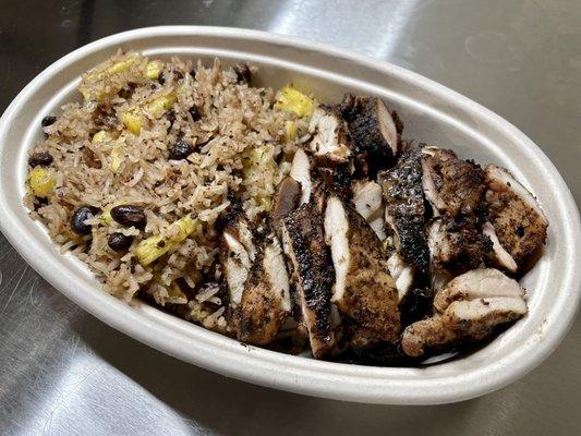 CARIBBEAN FLOW BOWL: Caribbean cuisine comes with jerk chicken, Caribbean rice, black beans, and pineapple.