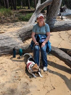 Sitting in the sand, enjoying watching the waves and looking at all the interesting trees.