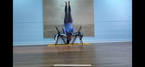 Shoulder stand with chairs