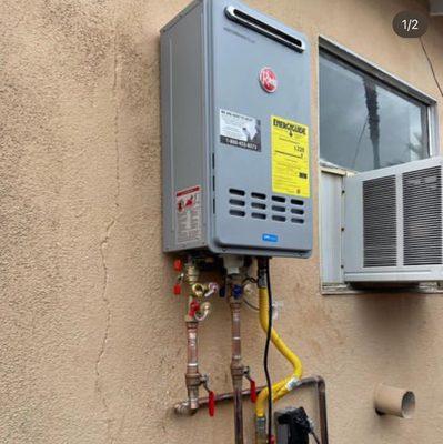 Tankless installation outside condo