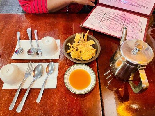 Table hot tea and hard noodles