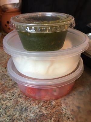 Mildly spicy green sauce, yogurt, and tomato and onion salad.