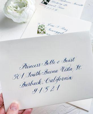 Classic script for these envelopes' addressing. The bride invited Princess Belle and The Beast... how cute is that!