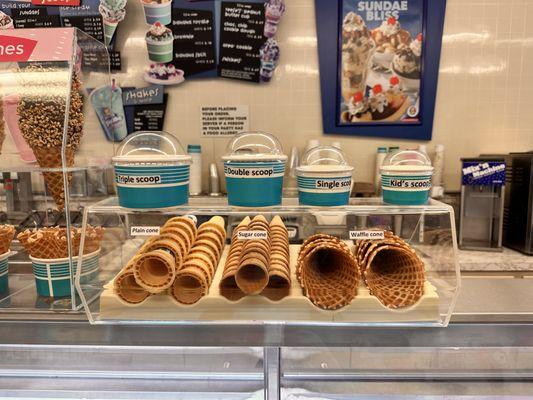 We have waffle cones, sugar cones, and cake cones in addition to cups