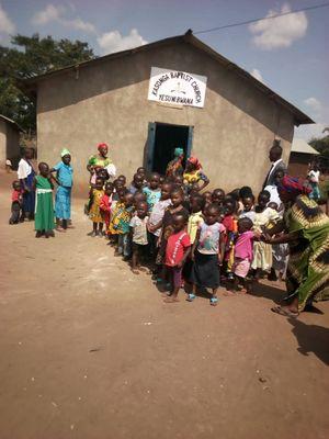 The children that we help get quality education in Uganda.