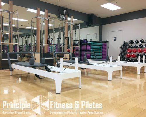 Contemporary Pilates Studio at Principle-Fitness & Pilates: Classes capped at 3 attendees for safety, quality, and one-on-one attention.