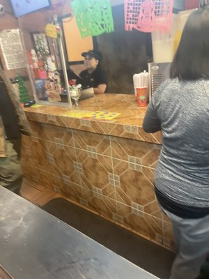 Miserable cashier, who clearly has no customer service skills. And making a burrito is a hard job.