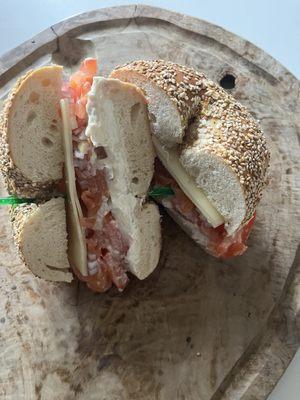 Cream cheese spread, lox, white fish salad, red onion, tomato, Swiss cheese